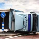 semi truck accident on its side on the highway